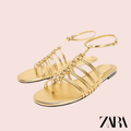 Sandalias Planas Doradas de Tiras con Nudo Zara